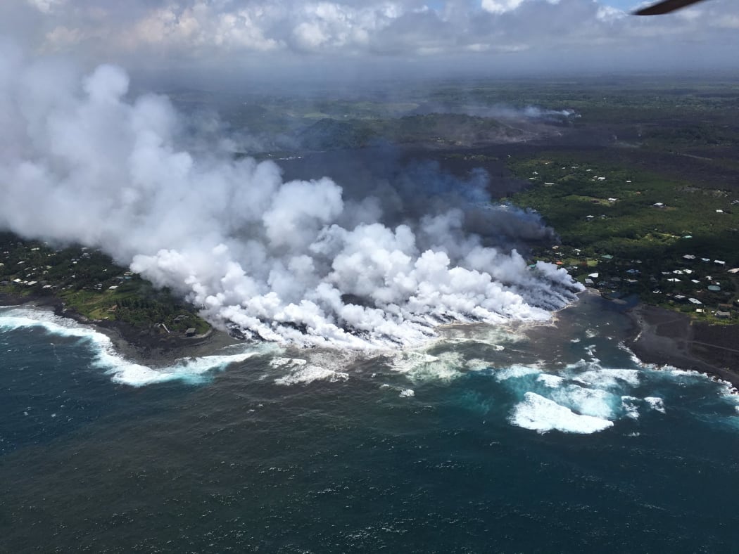 Lava flow from Fissure 8 Kilaua eruption spilling into Kapoho Bay