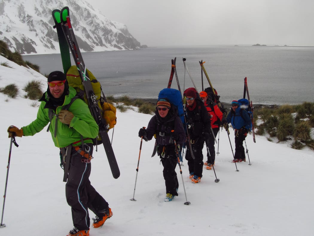 The Inspiring Explorers hiking above Fortuna Bay.