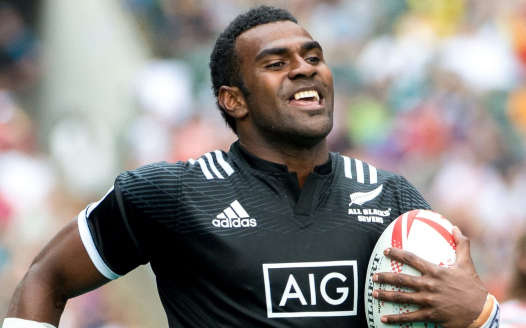 New Zealand's Joe Ravouvou runs in for a try.