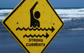 040314. Photo Todd Niall  / RNZ. Muriway beach, Auckland. Strong currents sign