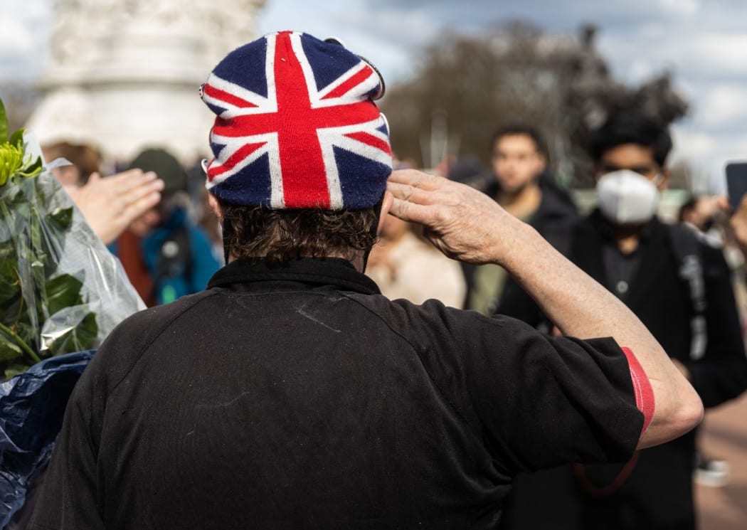 Scenes outside Buckingham Palace following the announcement of the death of The Prince Phillip, Duke of Edinburgh at the age of 99 on Friday 9th April 2021.