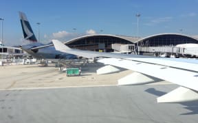 A Cathay Pacific jet taxis to the tarmac of the Hong Kong International Airport on 24 September.
