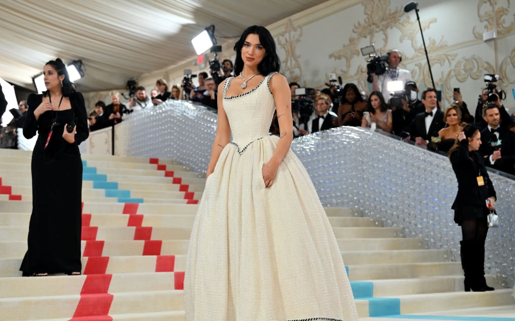 English singer-songwriter Dua Lipa arrives for the 2023 Met Gala at the Metropolitan Museum of Art on May 1, 2023, in New York. The Gala raises money for the Metropolitan Museum of Art's Costume Institute. The Gala's 2023 theme is “Karl Lagerfeld: A Line of Beauty.” (Photo by ANGELA WEISS / AFP)