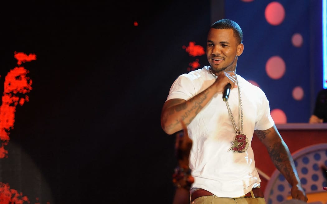 NEW YORK, NY - AUGUST 04: The Game performs during a visit to BET's "106 & Park" at BET Studios on August 4, 2011 in New York City.   Jemal Countess/Getty Images/AFP (Photo by Jemal Countess / GETTY IMAGES NORTH AMERICA / Getty Images via AFP)