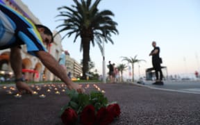 A wreath is laid at the promenade where, in 2016, a truck was driven into crowds celebrating Bastille Day in Nice, France, killing 86 and injuring 458 people.