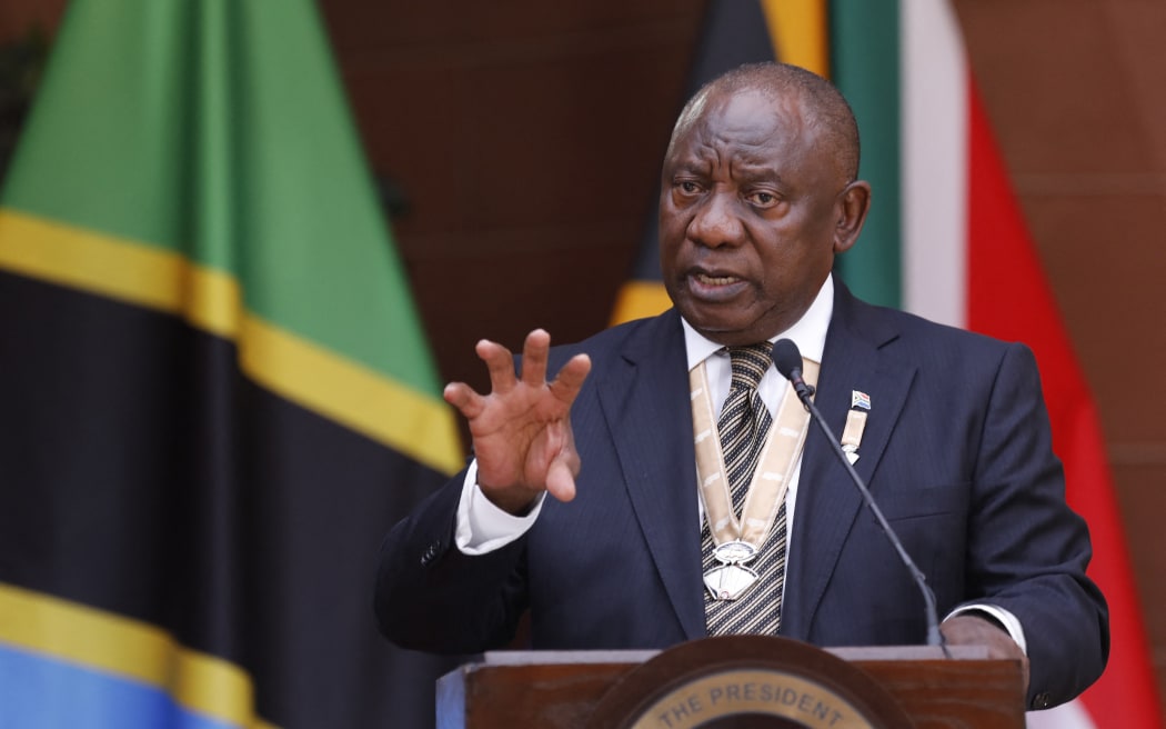 South African President Cyril Ramaphosa (R) speaks during a joint press conference withTanzanian President Samia Suluhu Hassan (not seen) during Hassan's state visit to South Africa at the Union buildings in Pretoria on March 16, 2023.
PHILL MAGAKOE / AFP