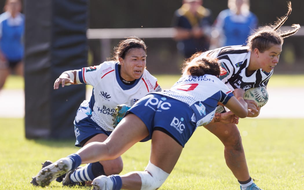 Hawkes Bay's Teilah Ferguson is tackled.