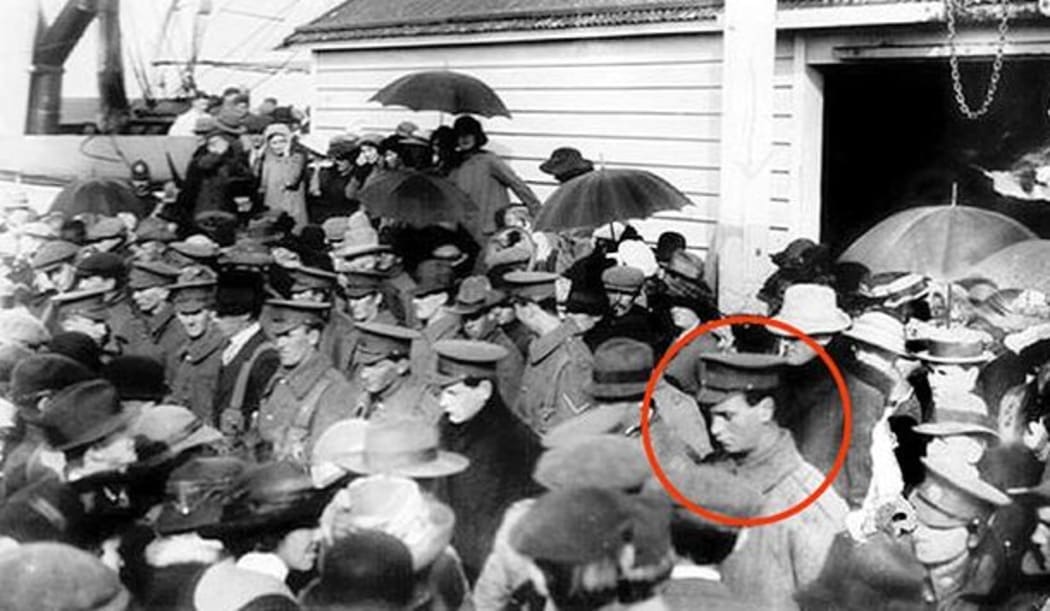 Private William Ham among soldiers - farewell muster at the old Motueka wharf.
