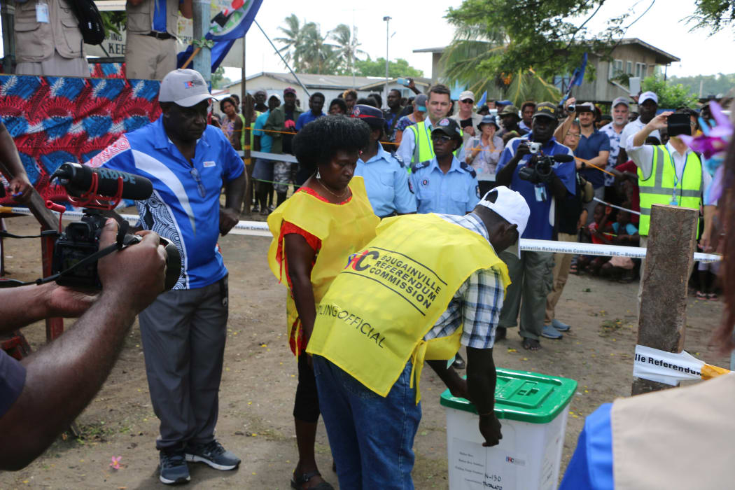 The first ballot box to be used in Bougainville's independence referendum is unlocked in Buka at the start of polling, 23 November 2019.
