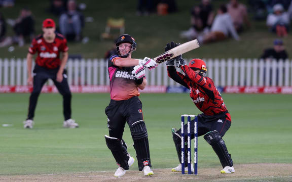 Tim Seifert bats against Canterbury.