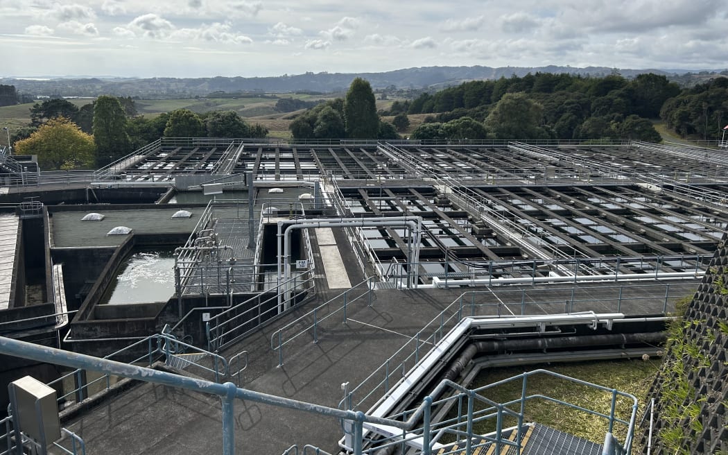 A photo showing the Ardmore Water Treatment Plant. Clarifiers and sand filters are set outdoors.