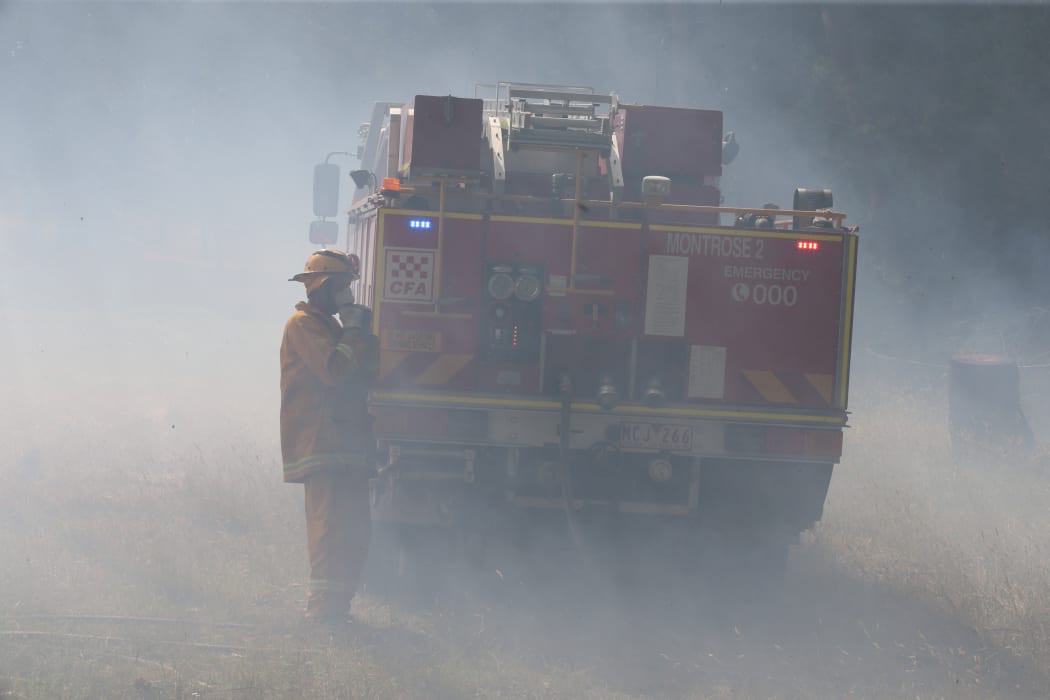 Firefighters battle a bushfire near Wandin, east of Melbourne, in December 2015.