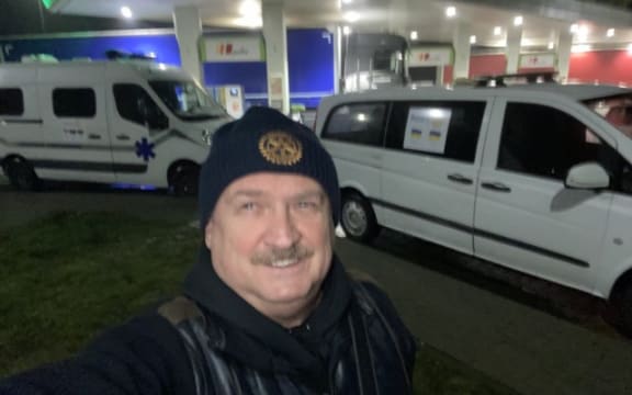 Senior Ukraine Rotarian Volodymyr Bondarenko with an ambulance part-funded by Rotary New Zealand World Community Service to replace one of the many destroyed in fighting.