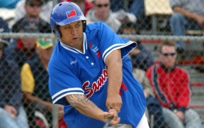 Samoa player-coach Duane Jerard at bat during the 2004 World Championships.