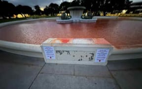 Vandalism at the fountain in Mission Bay on Anzac Day, with posters by Gaza protesters.