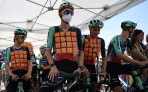 Decathlon CMA CGM Team's French rider Paul Seixas wears a vest of ice-packs to cool down at the start of the 9th stage of the 113th edition of the Tour de France cycling race, 154,6 km between Malemort and Ussel in central France, on July 12, 2026.