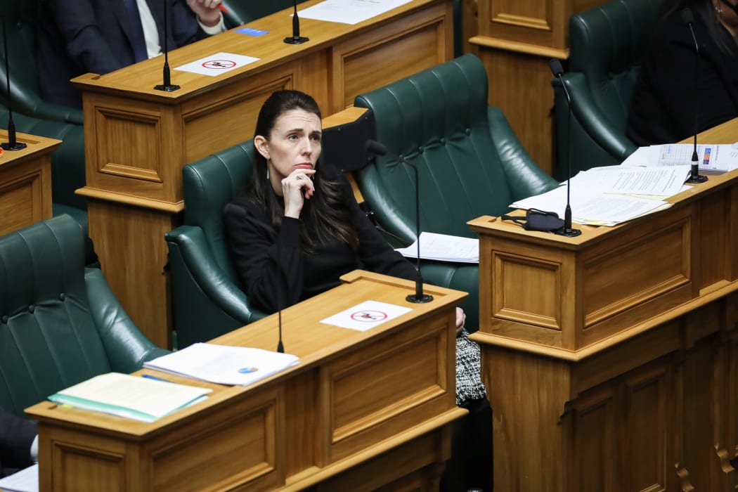 Jacinda Ardern listening carefully to a supplementary question