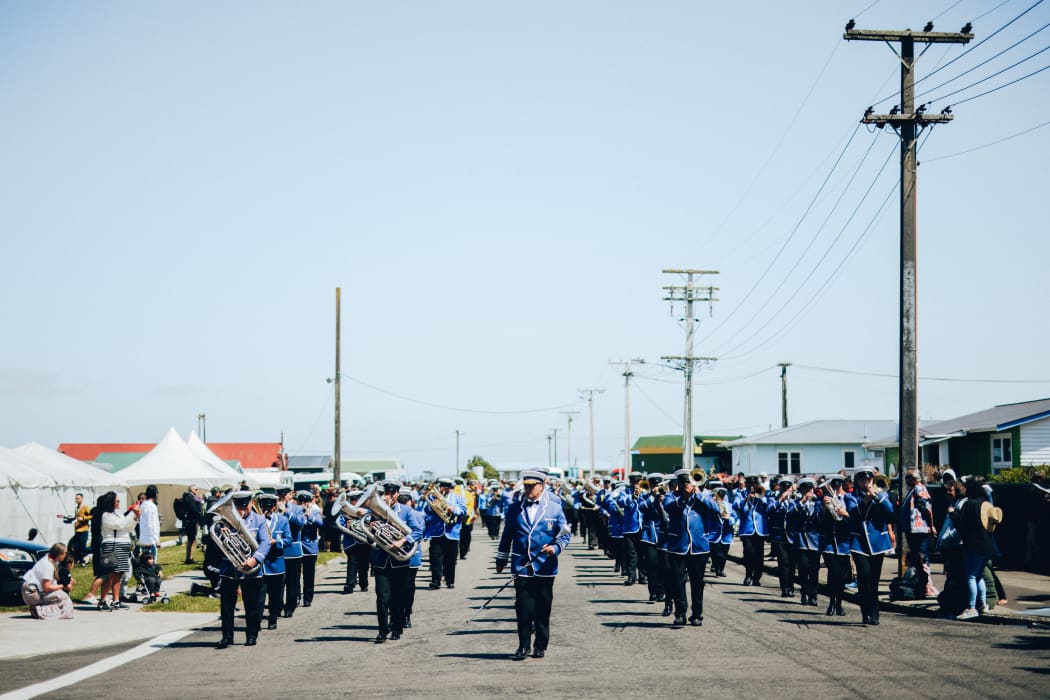 A band leads the procession of followers into Rātana temple as morehu celebrate the birthday of the faith's founder on 25 January, 2021.