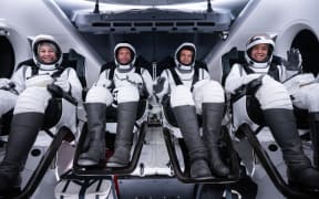 This photo courtesy of SpaceX shows Polaris Dawn astronauts Anna Menon (L), Scott "Kidd" Poteet (2L), Jared Isaacman (2R) and Sarah Gillis (R), sit inside the Polaris Dawn Crew Dragon Resilience on August 25, 2024, during a rehearsal of launch day in Cape Canaveral, Florida. The Polaris Dawn launch has already been postponed twice the week of August 27, first due to a technical issue with the ground-based rocket tower and then because of forecasted weather conditions at the planned splashdown site. (Photo by SPACEX / AFP) / RESTRICTED TO EDITORIAL USE - MANDATORY CREDIT "AFP PHOTO / HANDOUT / SPACEX " - NO MARKETING NO ADVERTISING CAMPAIGNS - DISTRIBUTED AS A SERVICE TO CLIENTS