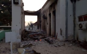 In this photograph released by Medecins Sans Frontieres (MSF) on October 3, 2015, fires burn in part of the MSF hospital in the Afghan city of Kunduz after it was hit by an air strike.