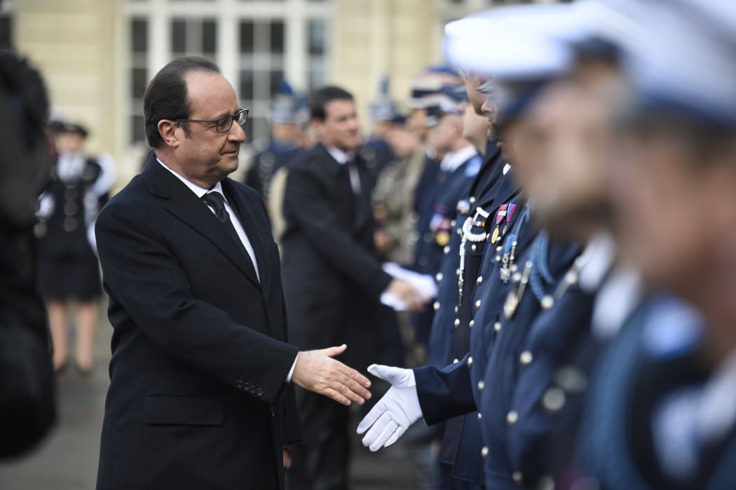 President Francois Hollande commemorates the attacks on Charlie Hebdo and a Jewish supermarket.