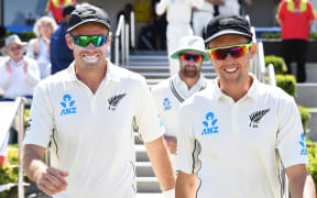 Trent Boult (right) playing against England in first test against Mount Maunganui in November.