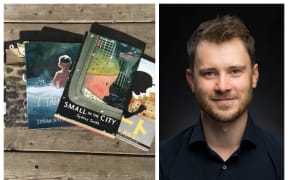 Illustrator Sydney Smith next to his books.