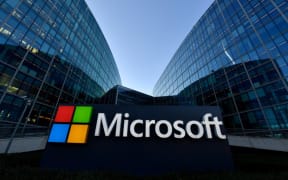 The logo of French headquarters of American multinational technology company Microsoft, is pictured outside on March 6, 2018 in Issy-Les-Moulineaux, a Paris' suburb.