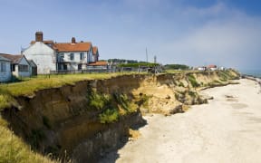 Eroded shoreline at Happisburgh, Norfolk, United Kingdom.