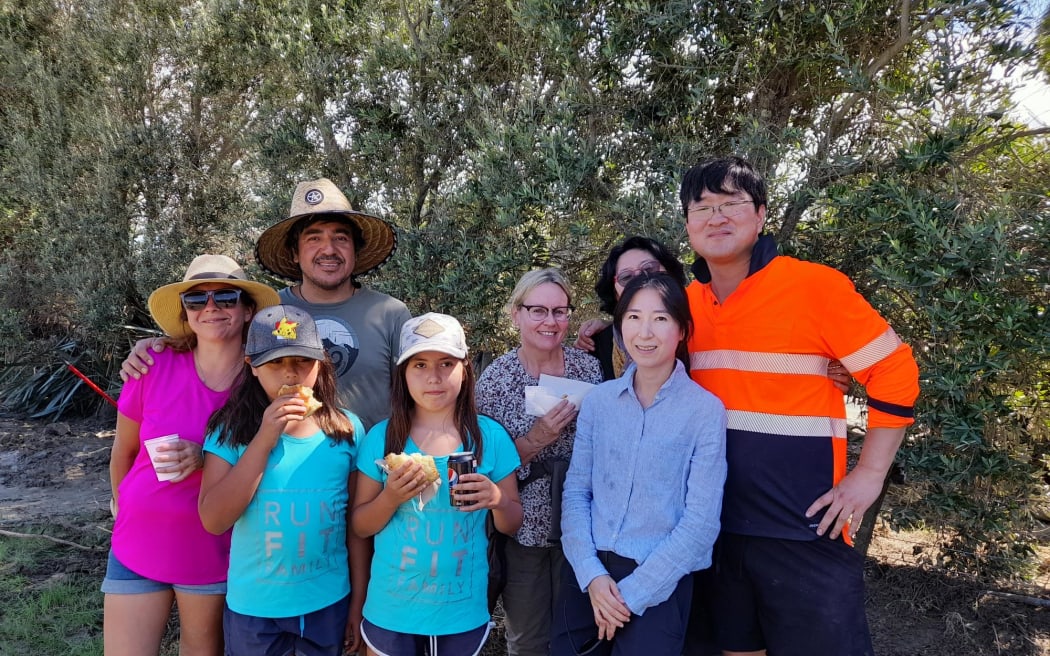 Family and friends mucking in at Pheasant Farm, in the Esk Valley, after Cyclone Gabrielle.