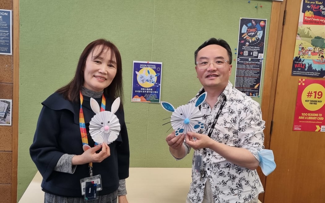 Izzy Zhang and her colleague run craft workshops at Auckland's Highland Park Library in celebration of the Mid-Autumn Festival.