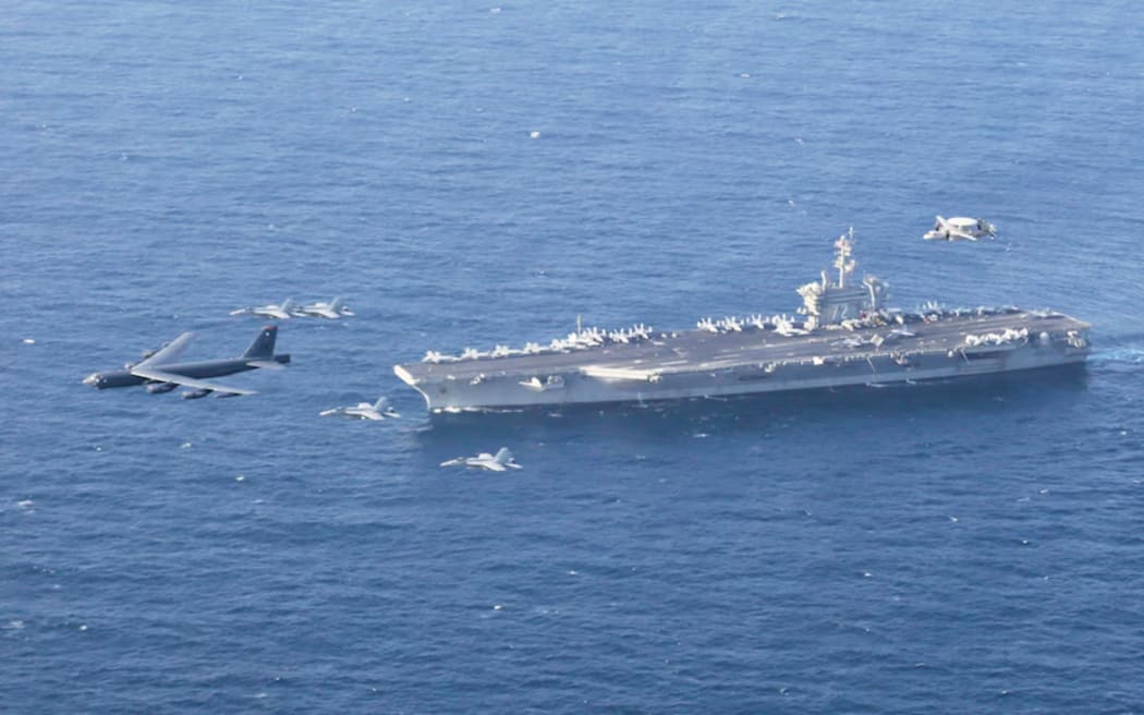 The USS Abraham Lincoln and three accompanying destroyers left the South China Sea and began heading to the Middle East last week.