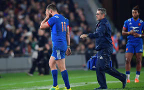 France's Remy Grosso (L) walks from the field after running into All Blacks Ofa Tu'ungafasi and Sam Cane during the Steinlager Series rugby match between the All Blacks and France at the Eden Park in Auckland on Saturday the 9th of June 2018. Copyright Photo by Marty Melville / www.Photosport.nz