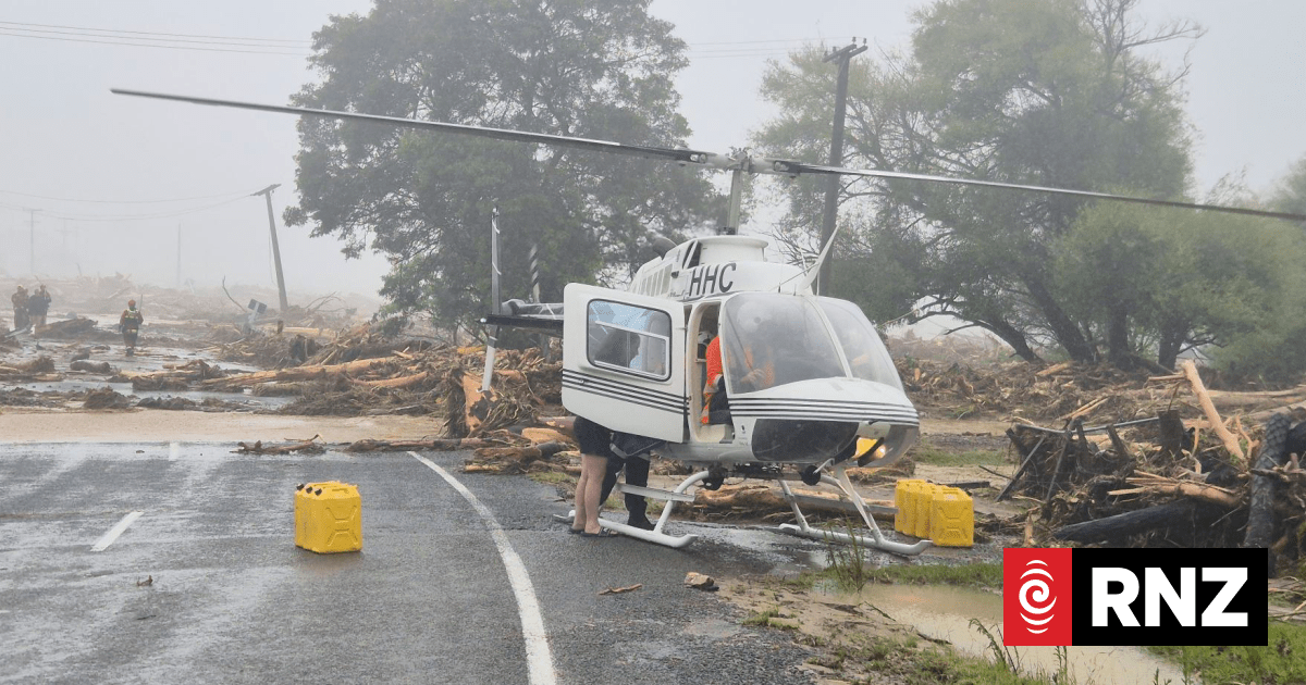 Helicopters dropping essential supplies into communities cut off by storm