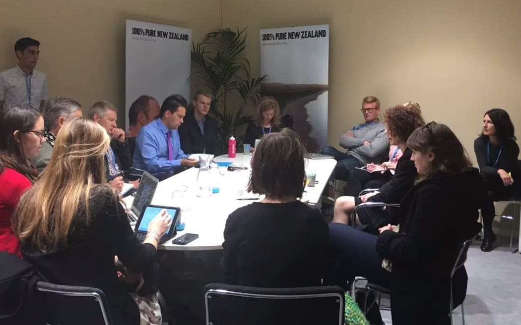 Climate change ambassador Jo Tyndall and associate climate change minister Simon Bridges brief NZ stakeholders and media in the NZ delegation room at Cop21.