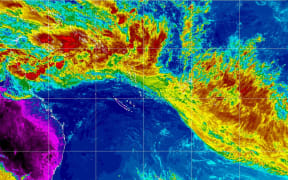 A satellite image shows the tropical depression TD03F and the band of low pressure across the South Pacific.