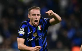 Inter Milan's Italian midfielder Davide Frattesi celebrates scoring