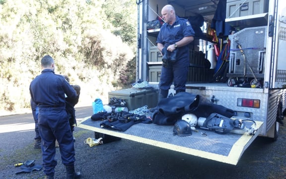 The police dive squad prepare to search for the two men lost in the Kaimanawa Forest.