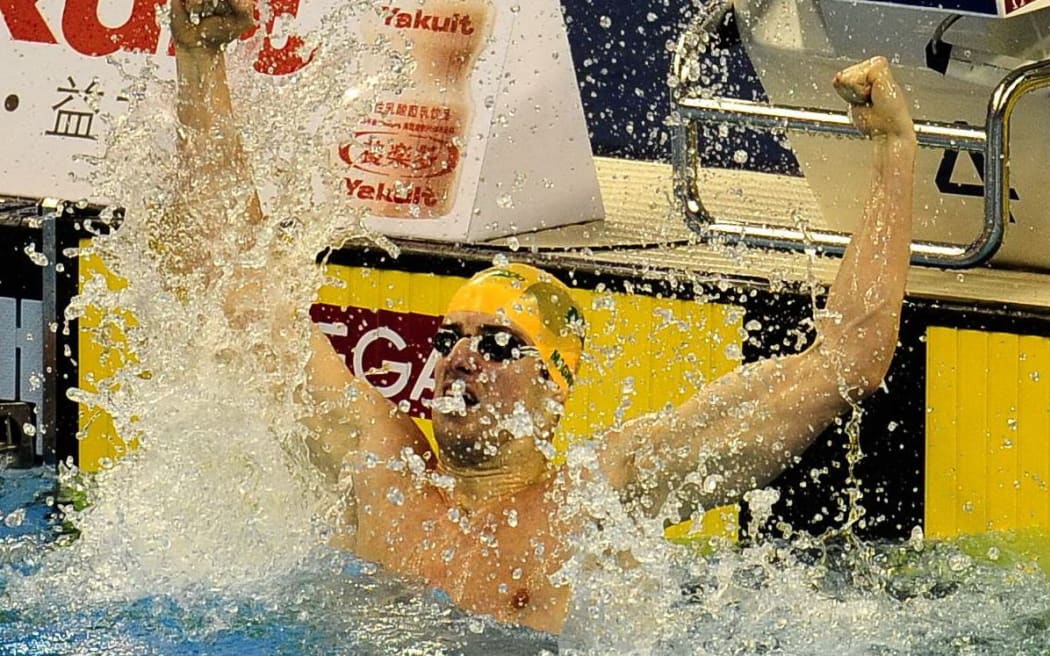Australian swimmer James Magnussen celebrates winning the gold medal in the men's 100m freestyle at the world champs in Shanghai in 2011.