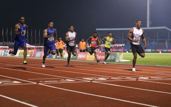 Banuve Tabakaucoro set a new Pacific Games record in the men's 100m final.