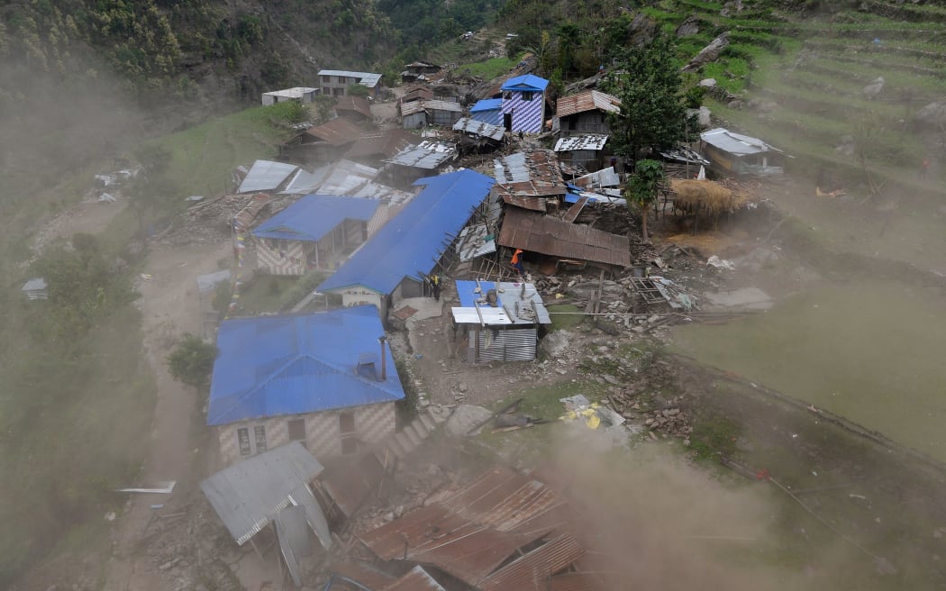 Damaged houses are seen from an Indian Army helicopter at Lapu in the Nepalese area of Gorkha.