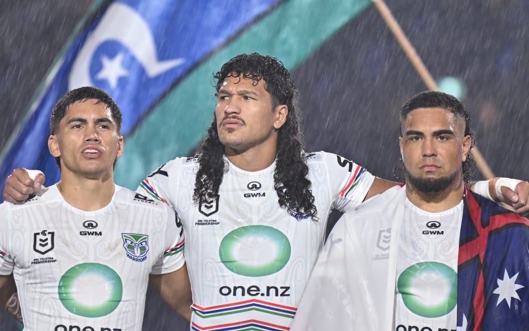 Taine Tuaupiki of the Warriors, Dallin Watene-Zelezniak of the Warriors and Erin Clark of the Warriors. Canterbury Bankstown Bulldogs v NZ Warriors.