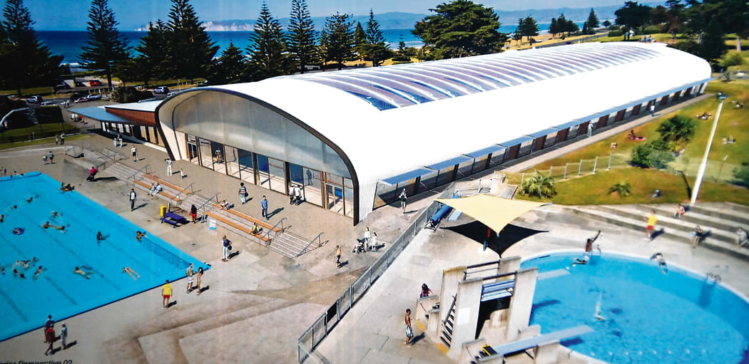 The new facility will include indoor pools, two outdoor pools, a water play area, and a new hydroslide.