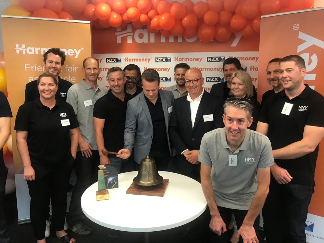 Harmoney CEO David Stevens rings the bell at the NZX to mark the start of trading.