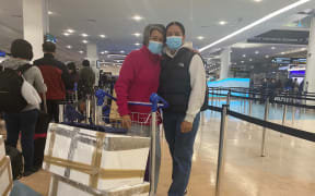 Vaiolama Feau and her mum getting ready for their quarantine free flight to Niue