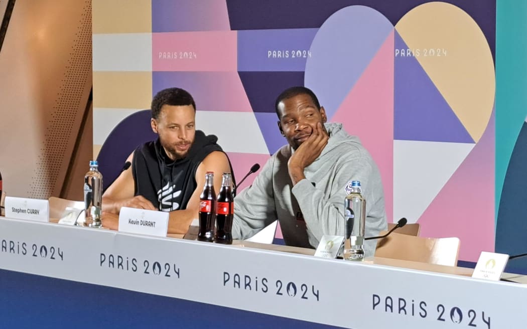 Steph Curry and Le Bron James at a media briefing at Paris Olympics