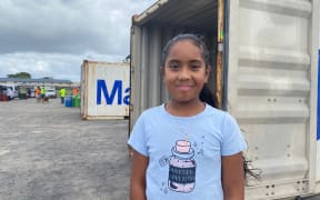 10-year-old Ariana Ekuasi delivers a message to her grandmother in Tonga