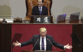 US President Donald Trump addresses the National Assembly in Seoul on November 8, 2017.
