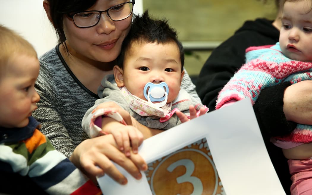 Grace Li, 9 months old (middle).