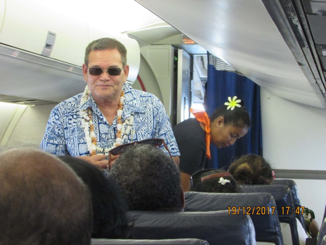 Kiribati Minister of Communications Willie Tokataake on aircraft